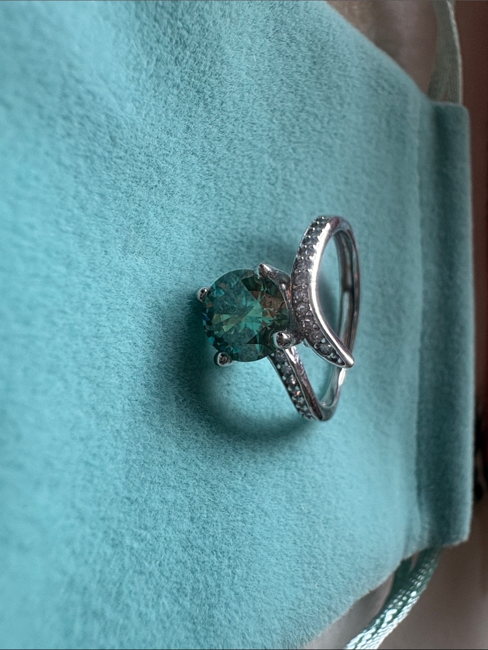 Silver Ring with Teal Green Center Stone and Pavé Band
